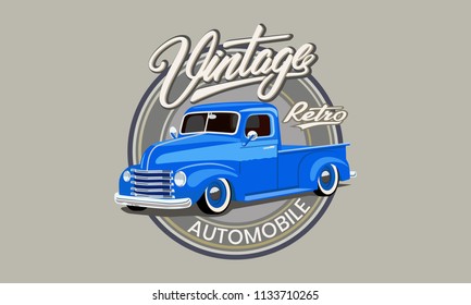 vintage blue car on the label with the labels and letters.