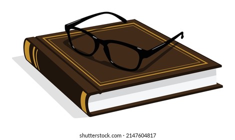 A vintage book with a black glasses