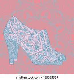 Vintage boots with flowers fabric. Boots background. Woman's boot. Abstract background with pink flowers shoes. high-heeled shoes with flowers fabric. High heels background with place for you text