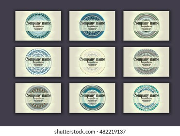 Vintage business visiting cards set. Ornamental mandala, ethnic circle decorative elements in boho style.