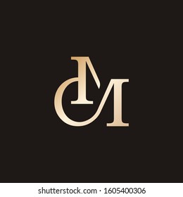 Vintage C and M initial gold monogram logo mark