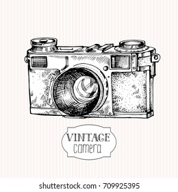 Vintage camera, hand drawn vector illustration