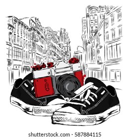 Vintage camera and sneakers on a city street. Vector illustration. Architecture.