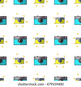 Vintage camera with stars. Seamless pattern. Vector illustration on white background. Background on the new magic camera.