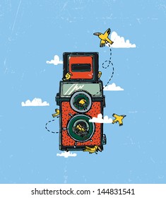 Vintage camera with two lenses and birds