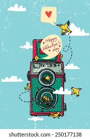Vintage camera with two lenses and birds, hand-drawn. Vector illustration.