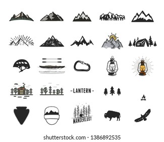 Vintage camping icons and adventure symbols illustrations set. Hiking shapes of mountains, trees, wild animals and others. Retro monochrome design. Can be used for t shirts, prints. Stock vector.