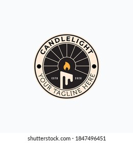 vintage candle emblem with flame vector logo illustration design