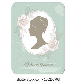 Vintage card with beautiful female silhouette framed with roses.