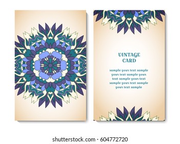 Vintage card or invitation with blue ornamental round pattern