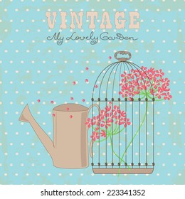 Vintage card with red flowers in old birdcage and garden watering can.
