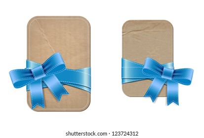 Vintage cardboard old paper banners decorated with blue silky ribbon and bow