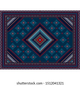 Vintage carpet in blue tones with a red diamond-shaped frame in the center with patterns of dark blue, red, bluish and gray colors

