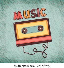 Vintage cassette tape and colorful wooden text Music on stylish green background.