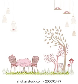 vintage chair and and the cage with a bird in the garden 