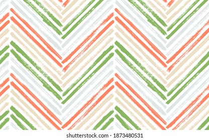 Vintage chevron interior print vector seamless pattern. Paintbrush strokes geometric stripes. Hand drawn paint texture zig zag chevron backdrop. Watercolor textile print seamless design.