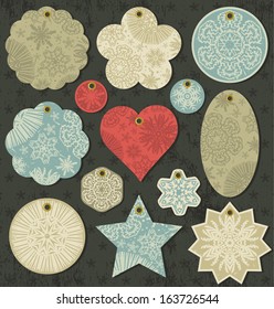 vintage christmas labels with different colors over grunge background. The shape is: star, flower, circle, heart, ellipse vector illustration