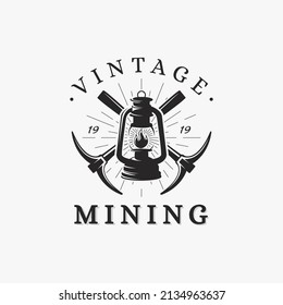 Vintage classic Mining Cave logo, axe and lantern logo vector on white background