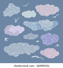 Vintage clouds set. Hand drawn vector illustration. Design element.