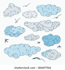 Vintage clouds set. Hand drawn vector illustration. Design element.