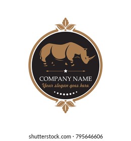 Vintage company logo with rhino as a symbol, black-brown vector logo concept