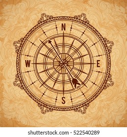 Vintage compass on aged paper background. Hand drawn vector illustration.