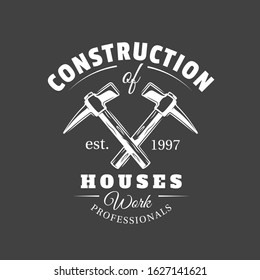 Vintage construction label. hammers located crosswise isolated on black background. Vector illustration