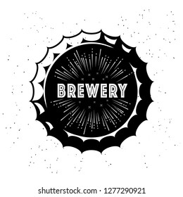 Vintage craft beer logo and brewery with wheat ear and inscription on bottle cap on white background