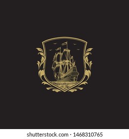 Vintage Crest with Majestic Sail Ship. Barbary Corsair Boat Ship in Classic Elegant Shield Style Cress with Gold on Black Background. 