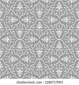 Vintage damask seamless pattern on grey background. Graphic pattern for fabric, wallpaper, packaging. Ornate Damask flower ornament.
