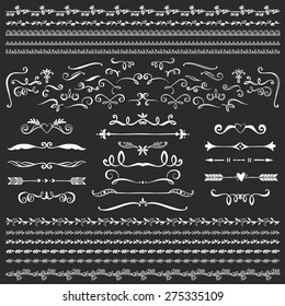 Vintage decorative curls and swirls collection. Hand drawn vector design elements on blackboard.