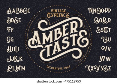 Vintage decorative font named "Amber Taste" with label design and background pattern - Shutterstock ID 475112953
