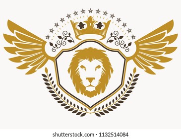 Vintage decorative heraldic vector emblem composed with eagle wings, wild lion illustration and royal crown