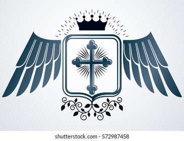 Vintage decorative heraldic vector emblem composed with religious cross, eagle wings and royal crown