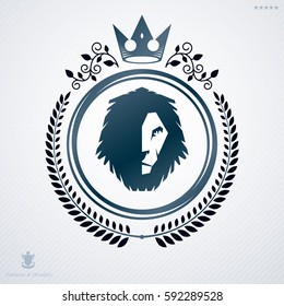 Vintage decorative heraldic vector emblem composed with lions head and royal crown