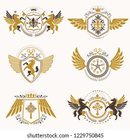 Vintage decorative heraldic vector emblems composed with elements like eagle wings, religious crosses, armory and medieval castles, animals. Collection of classy symbolic illustrations. 