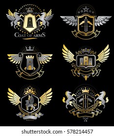 Vintage decorative heraldic vector emblems composed with elements like eagle wings, religious crosses, armory and medieval castles, animals. Collection of classy symbolic illustrations. 