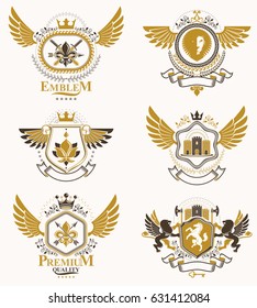 Vintage decorative heraldic vector emblems composed with elements like eagle wings, religious crosses, armory and medieval castles, animals. Collection of classy symbolic illustrations. 