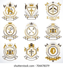 Vintage decorative heraldic vector emblems composed with elements like eagle wings, religious crosses, armory and medieval castles, animals. Collection of classy symbolic illustrations. 