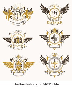 Vintage decorative heraldic vector emblems composed with elements like eagle wings, religious crosses, armory and medieval castles, animals. Collection of classy symbolic illustrations. 