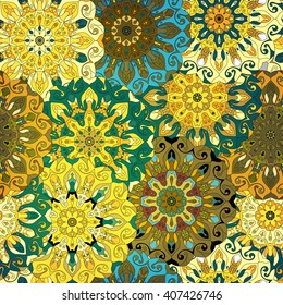 Vintage decorative pattern. Islam, Arabic, Indian, ottoman motifs. Perfect for printing on fabric or paper. Can be used for greeting card or booklet background.  Blue, yellow and orange colors.