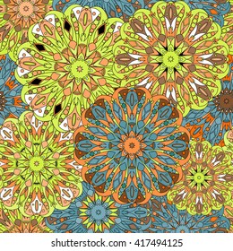 Vintage decorative pattern. Islam, Arabic, Indian, ottoman motifs. Perfect for printing on fabric or paper. Can be used for greeting card or booklet background. Blue, orange and green colors