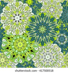 Vintage decorative pattern. Islam, Arabic, Indian, ottoman motifs. Perfect for printing on fabric or paper. Can be used for greeting card or booklet background. Green and blue colors