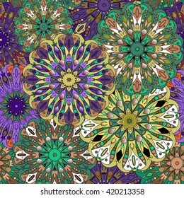 Vintage decorative pattern. Islam, Arabic, Indian, ottoman motifs. Perfect for printing on fabric or paper. Can be used for greeting card or booklet background.  Violet, green and brown colors
