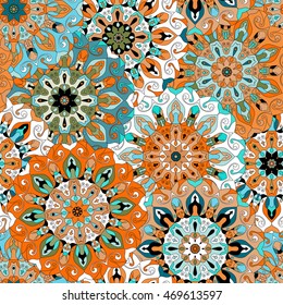 Vintage decorative pattern. Islam, Arabic, Indian, ottoman motifs. Perfect for printing on fabric or paper. Can be used for greeting card or booklet background. Blue and orange colors