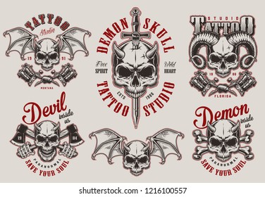 Vintage Demon Tattoo Studio Prints Set With Horned Devil Skulls Crossed Axes Bones Tattoo Machines Sword Isolated Vector Illustration