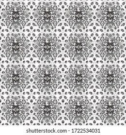 Vintage design in a black, white and gray and silver colors. Damask elegant wallpaper. Vector seamless pattern on a black, white and gray background.