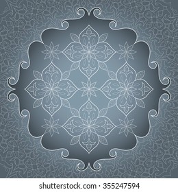 Vintage design on a gray background.  Ornate element for design. Ornamental lace pattern for invitations and greeting cards. Traditional floral white decor.