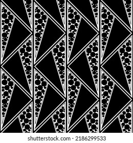 Vintage design for printing on fabric. Seamless pattern with triangles and dots. Scalable vector graphics. Repeating background. Seamless fabric texture print. Retro ornament.