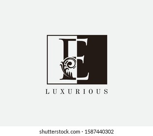 Vintage E Letter Classic Logo. Black and White E With Classy Leaves Shape design perfect for fashion, Jewelry, Beauty Salon, Cosmetics, Spa, Hotel and Restaurant Logo. 